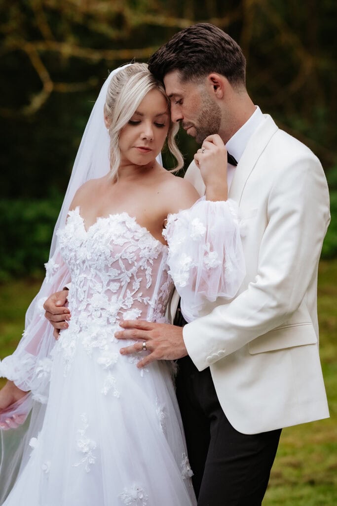 Editorial wedding portrait Essex showing bride in natural light with candid emotional moment captured by Lily and White Photography