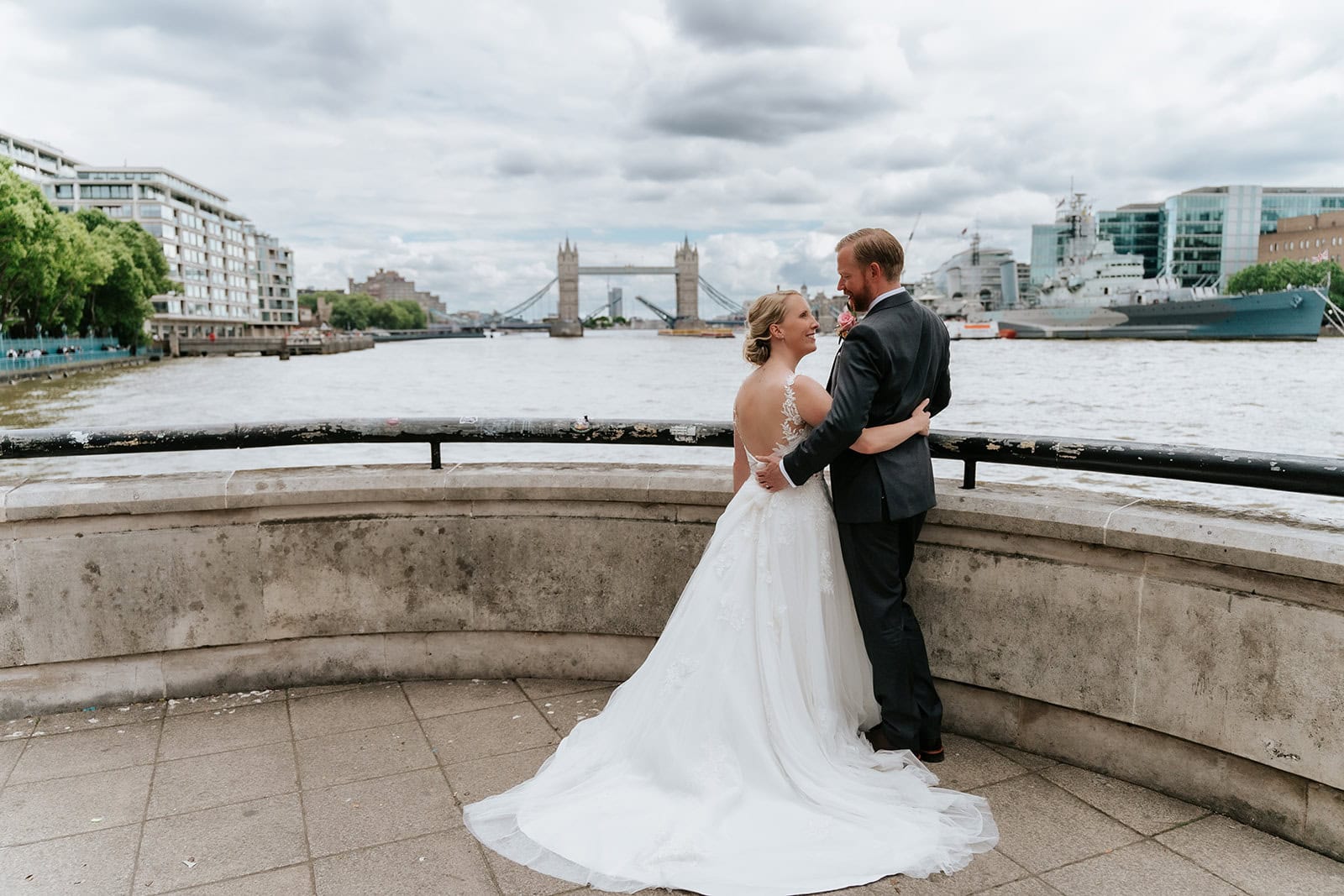 Editorial London wedding photographer documenting a couple at Tower Bridge; cinematic and grand-scale storytelling photography.